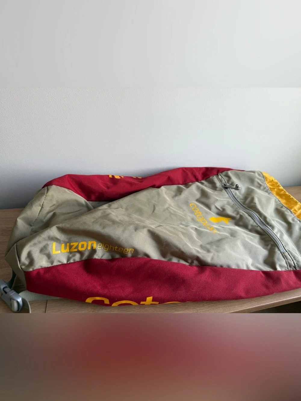 cotopaxi Maroon and Yellow Logo Daypack
